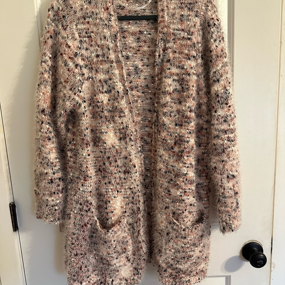 Torrid sweater size 2. Women’s plus size. Like new. Worn a couple times.
